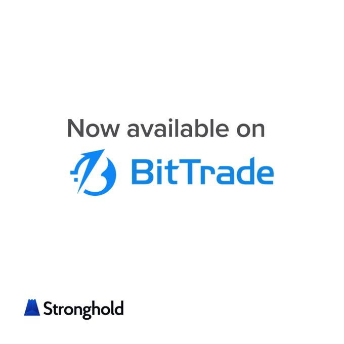 A simple white advertisement stating 'Now available on BitTrade' with the BitTrade logo and a Stronghold logo at the bottom.