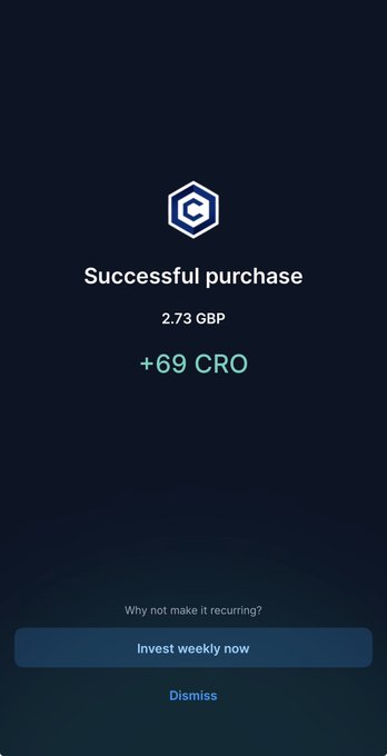 A Crypto.com app confirmation screen showing a successful purchase of "+69 CRO" for 2.73 GBP, with a green "Invest weekly now" button and "Dismiss" link below. The image illustrates Day 12 of the user's 69-CRO buying challenge, highlighting the completion of that day's CRO acquisition on the platform.