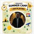 A Binance Summer Camp promotional graphic featuring a person labeled "I AM PLAYING" alongside icons of a hat, lemon, gold bar, and other items.
