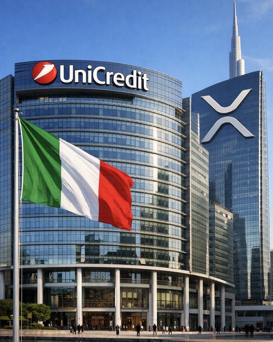 The image depicts the UniCredit Tower, the headquarters of UniCredit, Italy's second largest bank, featuring the company's prominent red logo and name on the glass facade, alongside an Italian flag waving in the foreground that reinforces its national identity, while a stylized "X" symbol appears on the adjacent building—cleverly incorporating visual cues that tie the financial institution to the post's mention of $XRP, though the scene itself is simply the bank's Milan headquarters with small figures of people gathered at its base.