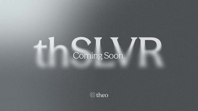 A minimalist grey gradient graphic with the blurred text 'theSLYVR' overlaid with 'Coming Soon' and a small 'theo' logo at the bottom.
