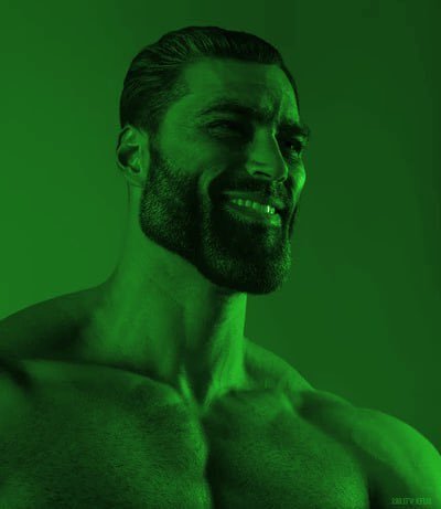 A shirtless, muscular man with a beard smiling against a solid green background, with faint text in the bottom right corner.