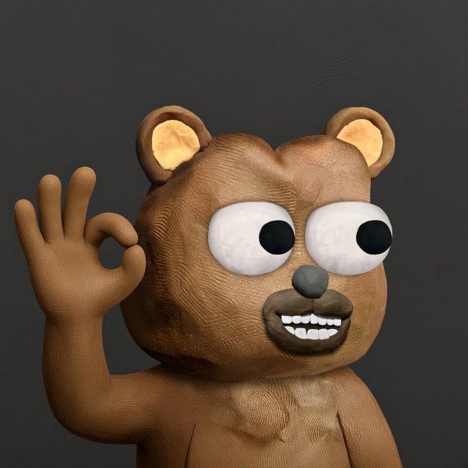 A 3D-rendered cartoon bear character with big bulging eyes and a toothy grin makes an 'OK' hand gesture against a dark background.