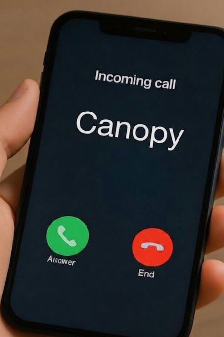 A hand holds an iPhone displaying an incoming call from 'Canopy' with green 'Answer' and red 'End' buttons.