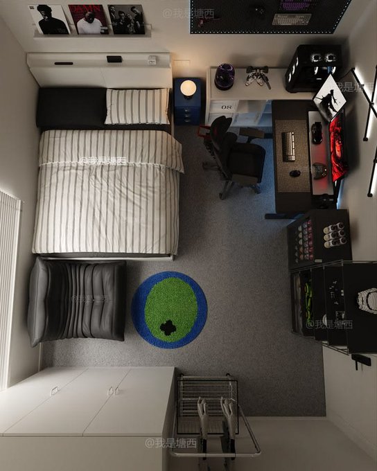 An overhead view of a modern bedroom featuring a bed with striped bedding, a gaming setup with a desk and RGB lighting, a black inflatable chair, and a green circular rug.