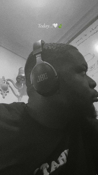 A black and white profile photo of a person wearing JBL headphones with the text 'Today...' and a white heart and green apple emoji overlay.