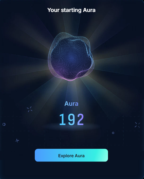 A digital screen showing 'Your starting Aura' with a value of 192 and an 'Explore Aura' button, featuring a 3D wireframe design.
