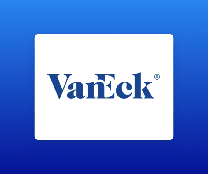 The image displays the VanEck® logo in blue lettering on a white background. It relates to the post as VanEck has asked the SEC to withdraw the registration statement for its planned Lido Staked Ethereum ETF ($stETH).