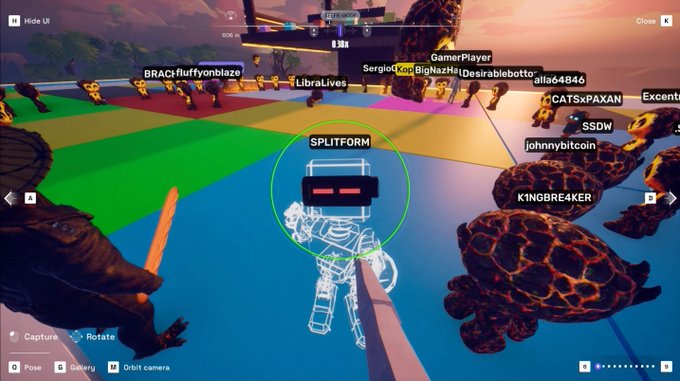 A screenshot from a Roblox-style game featuring a colorful arena with various player usernames like 'SPLITFORM', 'CATSxPAXAN', and 'KINGBR4KER' displayed above avatar characters.