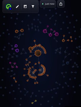 A dark app screen displaying particle physics or cellular structures with circular elements in orange and purple colors, with editing toolbar options at the top.