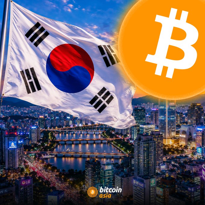 A composite image showing the South Korean flag waving over a cityscape at night with bridges, alongside a large orange Bitcoin logo, branded 'bitcoin asia' at the bottom.