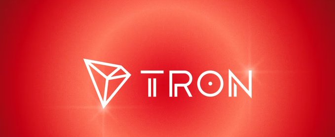 The image displays the TRON logo—a stylized 3D triangle—set against a vibrant red background with a glowing light effect, alongside the "TRON" text. This branding ties directly to the post's focus on TRON's milestone of surpassing $91B in stablecoin supply, reinforcing the network's identity as it celebrates the achievement.
