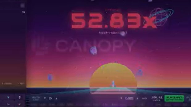 A digital display shows the text "52.83x CANOPY" over a vibrant sunset graphic with a small figure standing before a large sun.