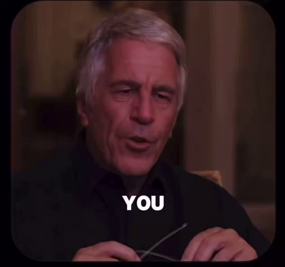 The image features a man with gray hair wearing glasses, sitting down and looking at something off-camera. Below his head, there's text that reads "You". The caption below the image also includes the phrase "Solana feeling good here btw Do you feel it?".