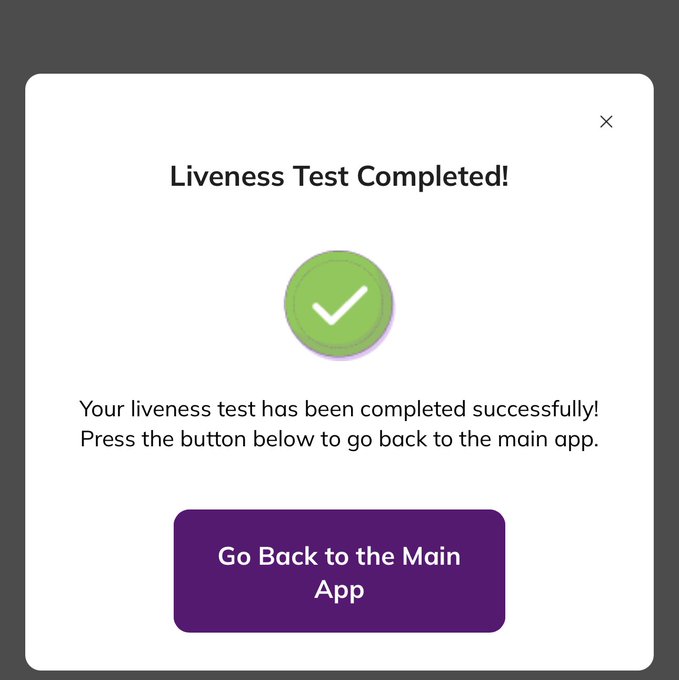 A confirmation dialog box displays "Liveness Test Completed!" with a green checkmark and a message stating the test was completed successfully, along with a purple "Go Back to the Main App" button. This image illustrates the user successfully passing Pi Network's Liveness verification, a step required to confirm the user is a real human and not a bot.