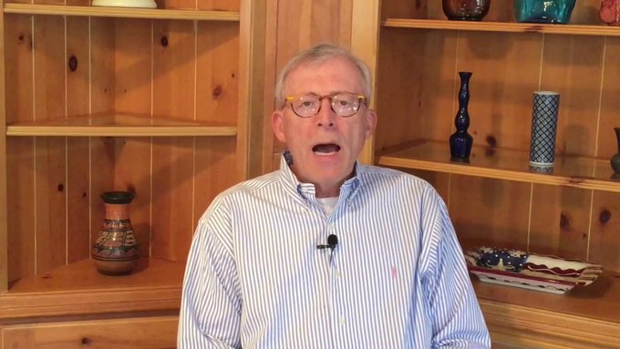 An older man with glasses and a striped shirt, identified as veteran trader Peter Brandt, speaks directly to the camera from what appears to be a home office, with a lavalier microphone clipped to his shirt. The wooden shelving behind him displays decorative vases and pottery, creating a casual backdrop as he discusses his bullish Ethereum price prediction.