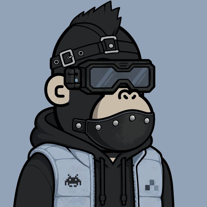 The image features a cartoon-style illustration of a monkey wearing glasses, goggles, and a black leather vest with an "ape0nchain" logo on it. The monkey appears to be looking off into the distance or at something out of frame. The caption provided in the image reads: "He looks kewl @ape0nchain".
