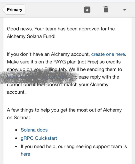 A white email with a black header and footer displays the text "Good news! Your team has been approved for the Alchemy Solana Fund."