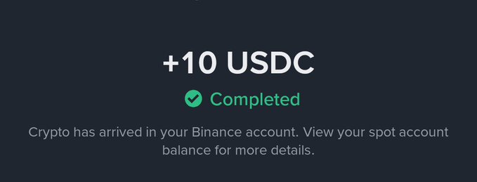 Binance app notification screen showing '+10 USDC Completed' with the message 'Crypto has arrived in your Binance account.'