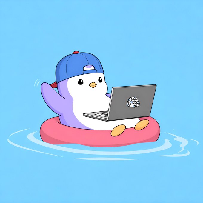 A cartoon illustration of a cute, round penguin wearing a blue and red baseball cap backwards, sitting on a pink inflatable ring in blue water while using a laptop.