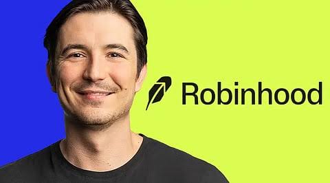 A smiling man with dark hair poses against a blue-to-green gradient background next to the Robinhood logo and brand name.
