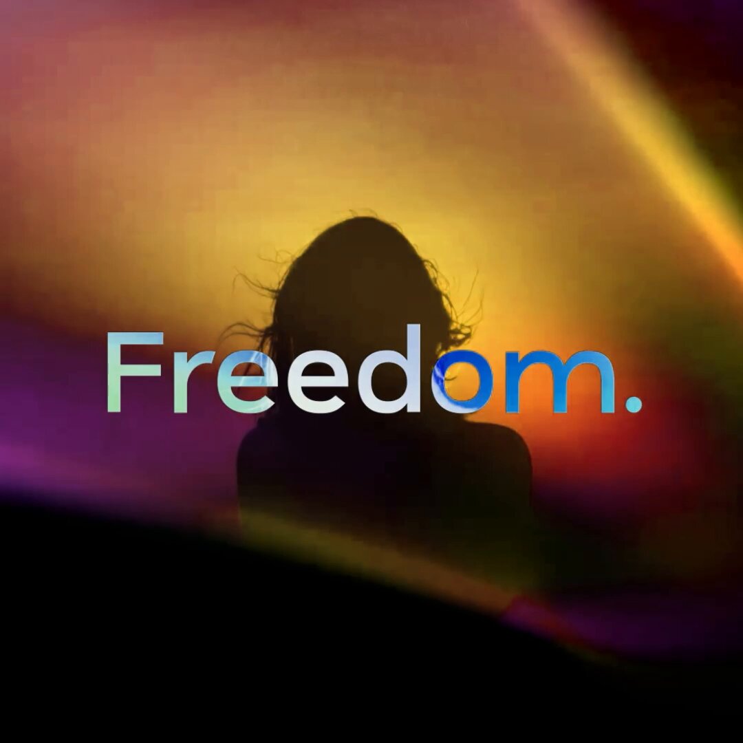 The image features a woman's silhouette against a colorful sunset background, with the word "FOUNDATION" written above her head. The text also includes the words "FREEDOM", which could be interpreted as a reference to the concept of digital currency or blockchain technology.