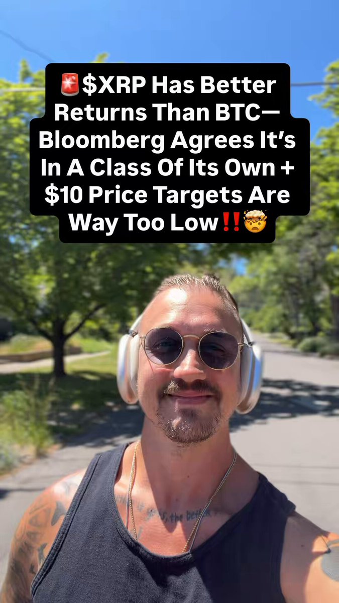 A man wearing a black tank top with headphones on his head, smiling for the camera, as well as sunglasses while posing outdoors on a tree-lined street. The background includes green trees and a clear blue sky. A caption on this photo reads, "XRP Has Better Returns Than BTC—Bloomberg Agrees It's In A Class Of Its Own + $10 Price Targets Are Way Too Low".