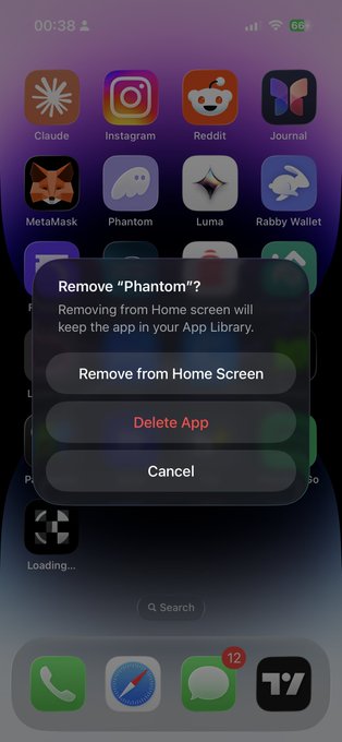 The image shows an iPhone screen displaying a pop-up dialog that confirms the removal of the "Phantom" app, with options to "Remove from Home Screen," "Delete App," or "Cancel." This visualizes the post's message of saying goodbye to Phantom after it supported Monad, as the user is in the process of uninstalling the app.