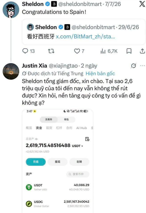 Screenshot of a tweet by 'Sheldon (@sheldonbitmart)' congratulating Spain, followed by a Vietnamese comment asking about withdrawal issues on BitMart, showing an account balance of 2,619,715 USDT.