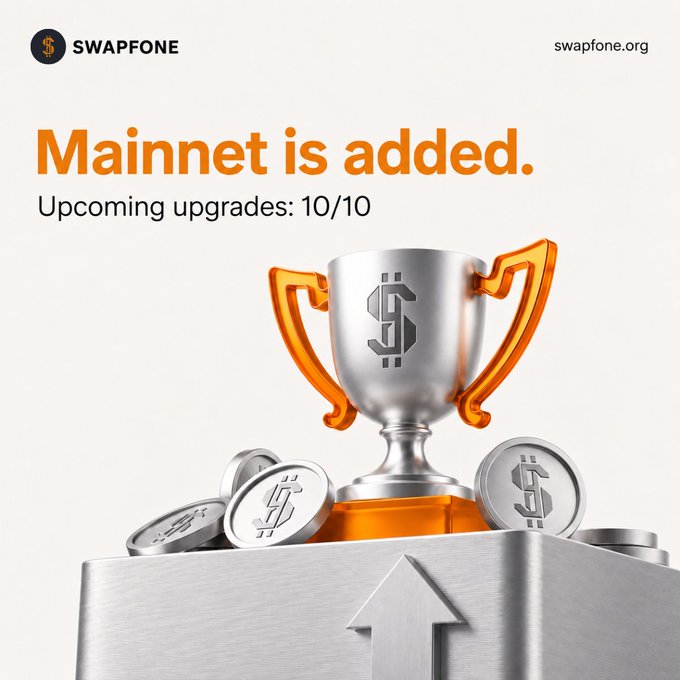 A promotional graphic from Swapfone (swapfone.org) announces "Mainnet is added" as the final upgrade, reading "Upcoming upgrades: 10/10," featuring a silver trophy with orange handles and dollar-sign coins atop a metallic base with an upward arrow, symbolizing achievement and growth as the project completes its 10-upgrade milestone before the mainnet switch.