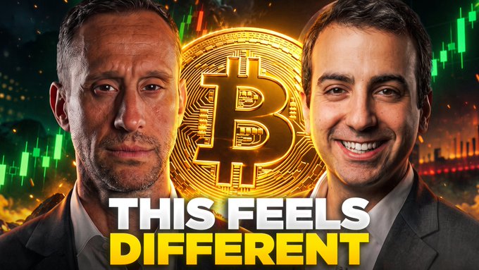 The image is a YouTube thumbnail featuring two men flanking a glowing golden Bitcoin coin with green candlestick charts in the background, and the bold text "THIS FEELS DIFFERENT" at the bottom. It relates to the post by highlighting Bitcoin's 22% surge outpacing stagnant stock markets, with the dramatic visual and text suggesting the hosts are warning viewers that something significant may be shifting in the market.