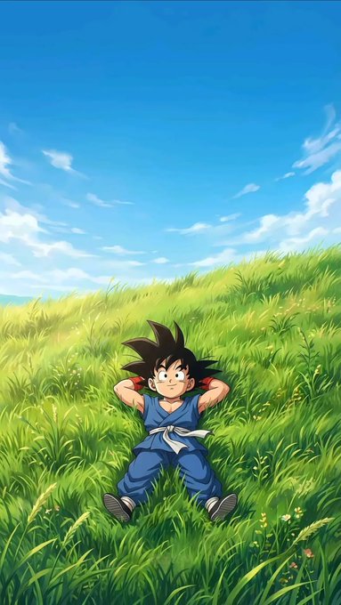 An animated illustration of young Goku from Dragon Ball relaxing in a grassy field under a bright blue sky with scattered clouds.