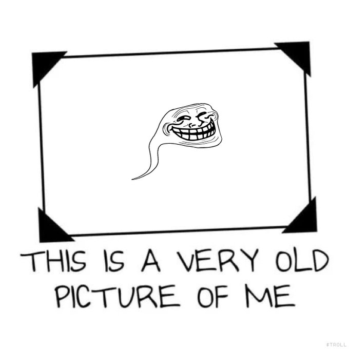 A meme featuring the classic troll face in a black-and-white framed photo with the caption 'THIS IS A VERY OLD PICTURE OF ME' written below.