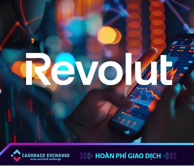Promotional banner for Revolut featuring a person holding a smartphone displaying trading charts, with text for 'CASHBACK EXCHANGE' and Vietnamese text 'HOÀN PHÍ GIAO DỊCH'.