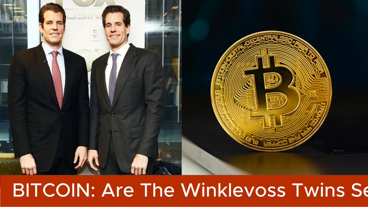 The image shows two businessmen wearing suits standing next to each other with a golden Bitcoin coin placed between them, possibly indicating one of them might be an expert or associate. A text overlay above and below the coin reads " Bitcoins" and "Are The Winklevoss Twins Selling Bitcoin?". Below this, there is another text reading "A wallet linked to the Winklevoss Twins transferred 1,000 $BTC to a Gemini hot wallet, according to Arkham", suggesting that one of them might be involved in Bitcoin transactions or investing.