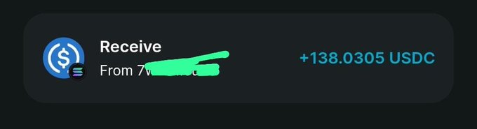 A digital wallet notification showing a received transaction of +138.0305 USDC, with the sender's name partially obscured in green.