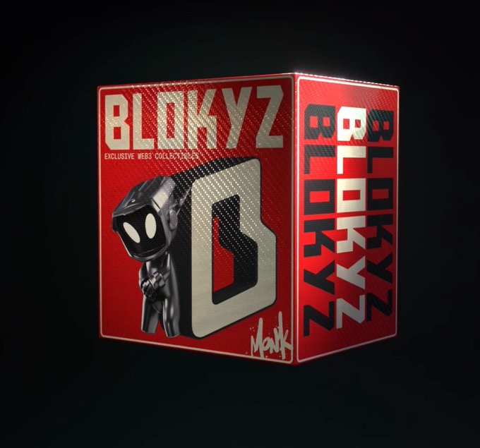 A red metallic box of 'BLOKYZ' exclusive web collectibles featuring a black robot figure with white eyes, labeled 'Mark'.