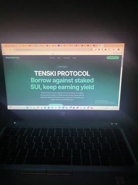 The image shows a laptop screen displaying a webpage titled "Tenski Protocol" with the text "borrow against your staked SUI, keep earning yield". The website appears to be related to a project called "Tenski Protocol", which is built on the site tenskiprotocol.epochsui.com and has been deployed in minutes without giving up its yield.