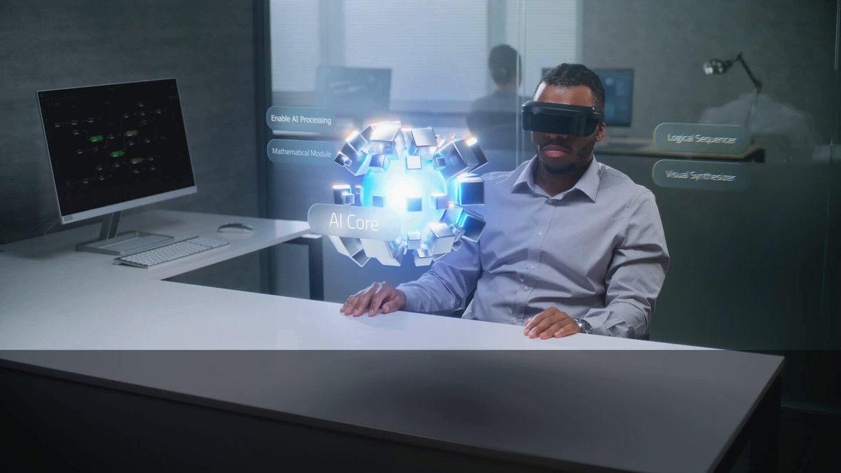 The image shows an office setting with a man sitting at a desk wearing a virtual reality headset. The man appears to be using a computer monitor, keyboard, and mouse while wearing the headset. The background of the image features a window that allows natural light into the room. There is also a text overlay in the image that reads "Global agent economies require infrastructure that can coordinate across networks, identities, and execution environments". This suggests that the man's use of virtual reality technology could be related to his work or business operations within an increasingly interconnected world where digital technologies are being used for various purposes such as communication, collaboration, and data analysis.