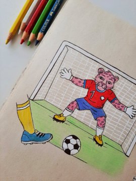 Child's colored pencil drawing of a pink leopard goalkeeper in a red #7 jersey diving for a soccer ball in front of a goal net.