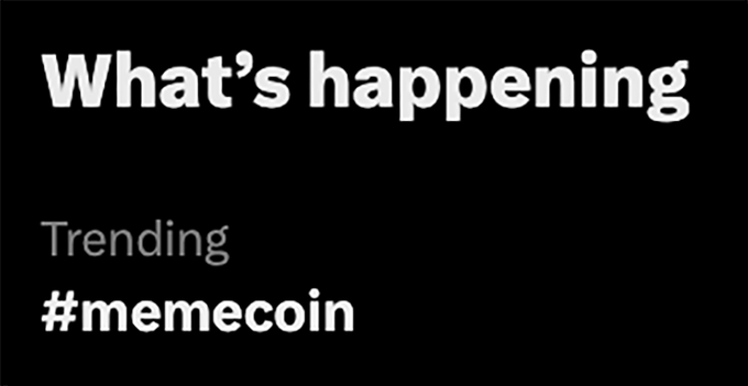 The image shows a black screen with white text reading "What's happening" at the top, followed by a "Trending" section featuring the hashtag "#memecoin" in bold. It appears to be a screenshot from Twitter/X's trending topics, visually supporting the post's claim that memecoins are having a "super szn" (super season).