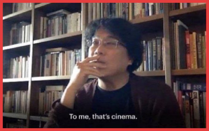 A screenshot of a man wearing glasses, sitting thoughtfully in front of a bookshelf, with the subtitle "To me, that's cinema." displayed at the bottom.