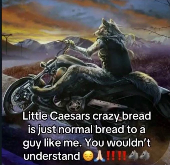 A fantastical image of an anthropomorphic wolf riding a motorcycle at sunset, captioned 'Little Caesars crazy bread is just normal bread to a guy like me. You wouldn't understand 😌🙏‼️🐺🐺'.