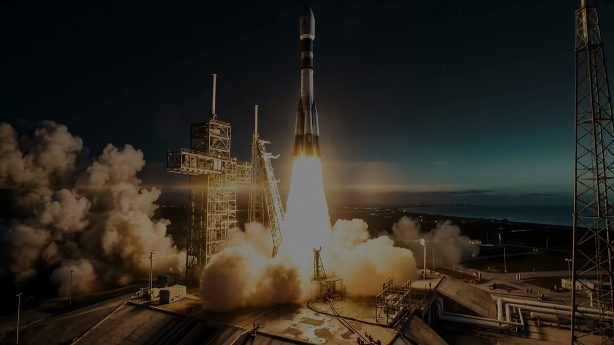 The image shows an exciting scene of a rocket launch taking place at night. The rocket is launching into space with its powerful engines propelling it upwards. The sky serves as a backdrop for this thrilling event, creating a sense of awe and wonder. In the background, there are several towers that could be related to the launch or other aspects of the space program. The image also includes text that reads "Hyperliquid'S" and "Kinetiq Launch", which might be related to the rocket launch or some other aspect of the event.