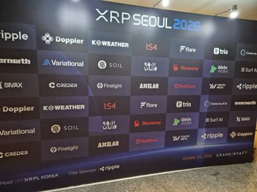 A sponsor wall for the 'XRP SEOUL 2026' conference, listing numerous sponsor logos in a grid format.