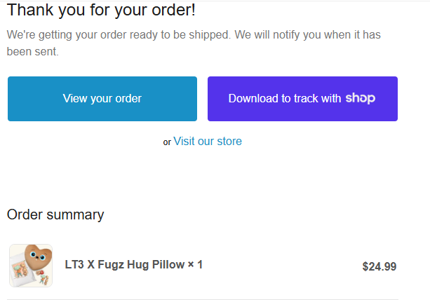 An order confirmation page thanking the customer for their order, showing a 'LT3 X Fugz Hug Pillow' for $24.99 in the order summary along with options to view the order or download a tracking app.