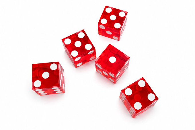 Five translucent red dice rest on a white surface, each showing five pips on its top face, illustrating the use of dice to generate a random and secure passphrase as mentioned in the tutorial.