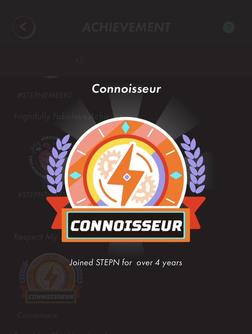 The image shows a black background with an orange and white logo for "Connoisseur" that reads "CONNOISSEUR". The text also mentions that the user has achieved something, possibly a milestone or accomplishment, which could be related to the social media platform they are using.!