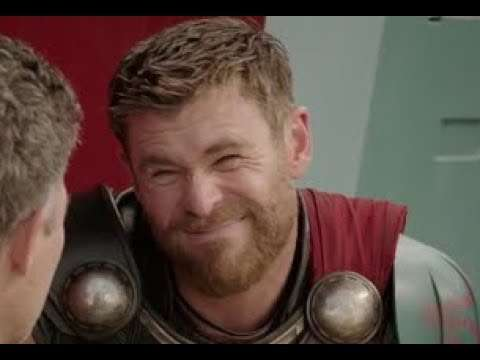 The image shows a character resembling Thor, the Marvel superhero, winking with a playful smirk while wearing his iconic red cape and armor. In the context of a post about Bitcoin being a cryptocurrency, the meme humorously personifies the digital currency as a confident, mischievous figure—suggesting that Bitcoin, like the playful god, winks at investors as they ponder its mysterious and powerful nature in the financial world.