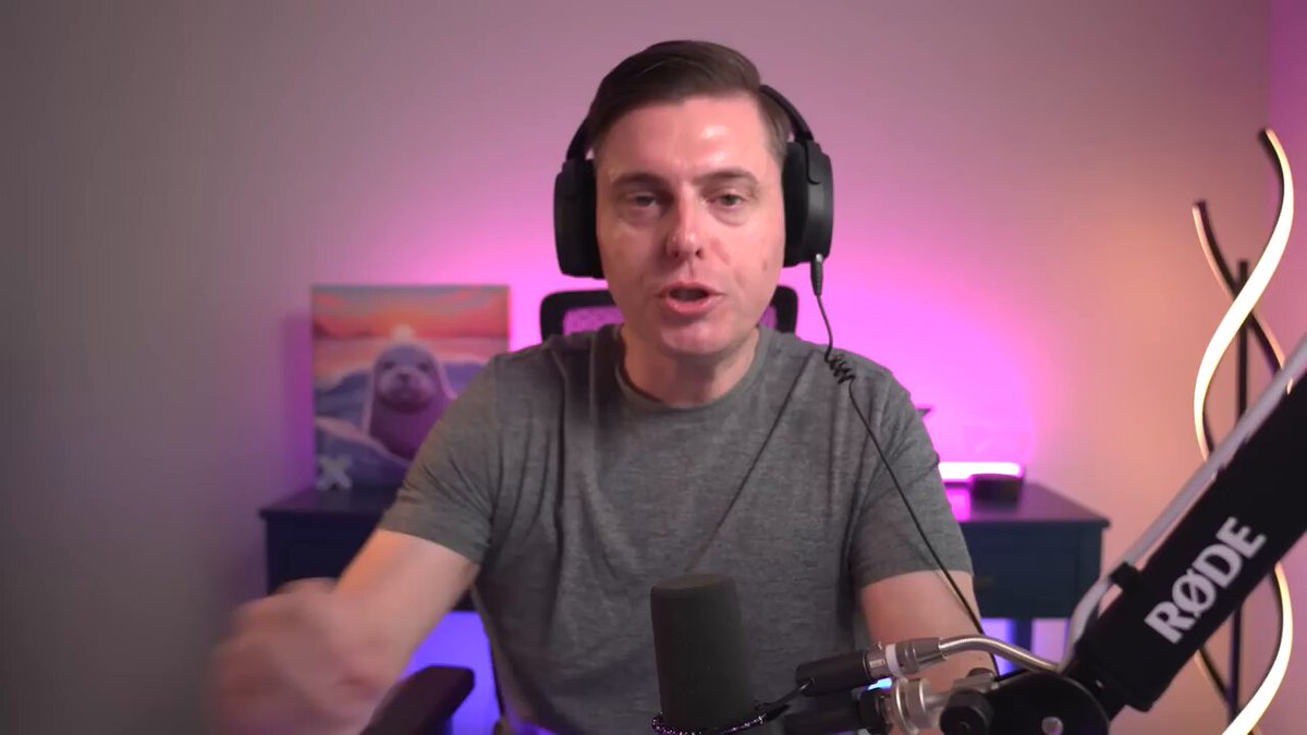 The image shows a man wearing headphones sitting at a desk with a microphone in front of him, suggesting that he might be participating in an online meeting or event. The caption reads "The CLARITY Act just got a major push More than 200 crypto organizations, including Ripple, Coinbase, Binance, Uniswap, and Hedera", which indicates the man's involvement in a discussion about cryptocurrency regulation. This could be related to the recent news of the Senate passing the CLARITY Act, which aims to clarify the legal status of cryptocurrencies by removing ambiguity surrounding their use as currency or property. The image captures the moment when the bill was signed and is now being discussed among various organizations.